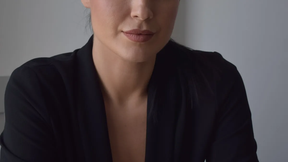 Professional corporate headshot in a black blazer, shot by Photoczaro in Dubai